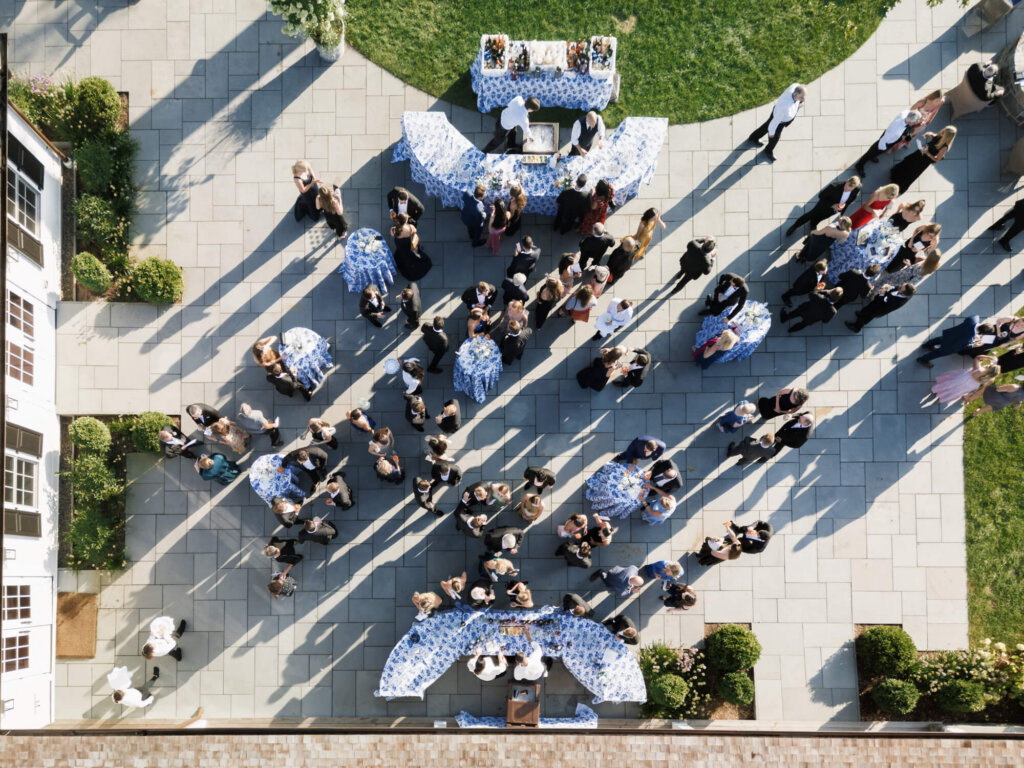 Aerial view of cocktail hour on the terrace at Bedford Golf and Tennis Club