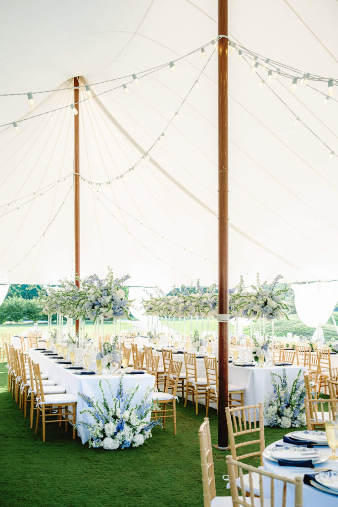 Reception table design under the tent at Bedford Golf and Tennis Club