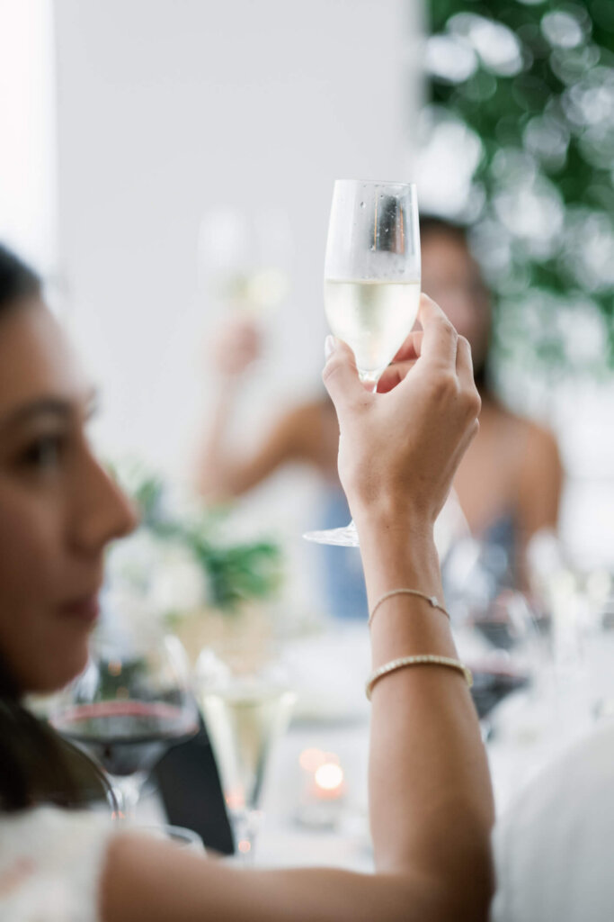 Champagne toast at the New York welcome dinner before the Bedford wedding weekend