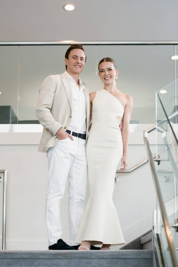 Louise and James portrait in cream outfits before their Bedford wedding weekend