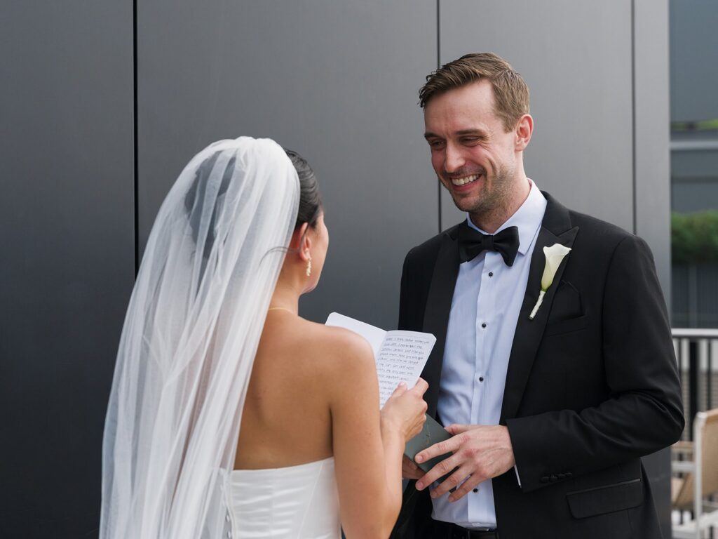 Tiffany and Tim reading private vows during their first look