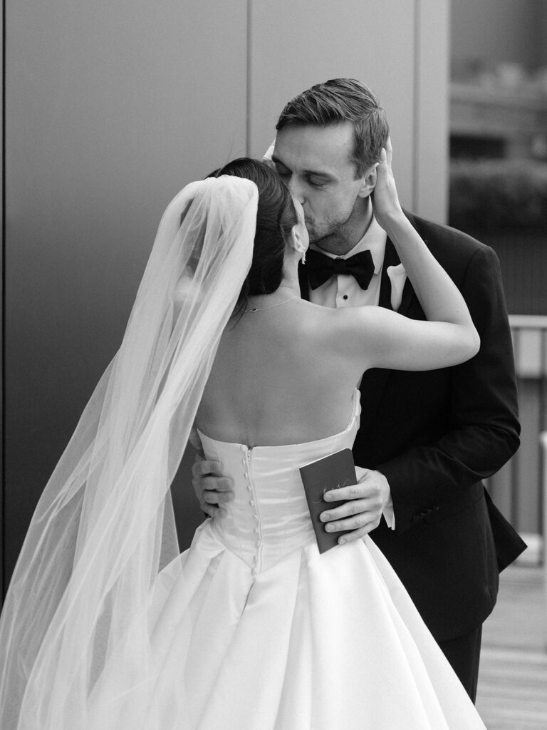 Tiffany and Tim kissing after their private vows