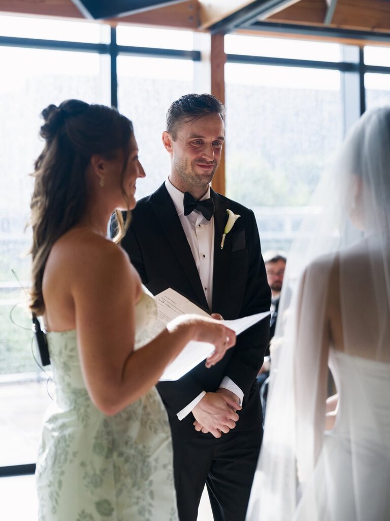 Taylor officiating Tiffany and Tim's District Winery wedding ceremony