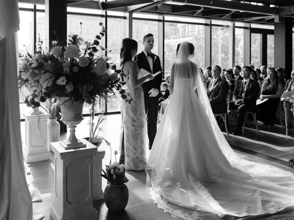 Tiffany and Tim exchanging vows at District Winery