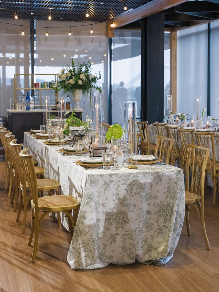 District Winery reception table with patterned botanical linen