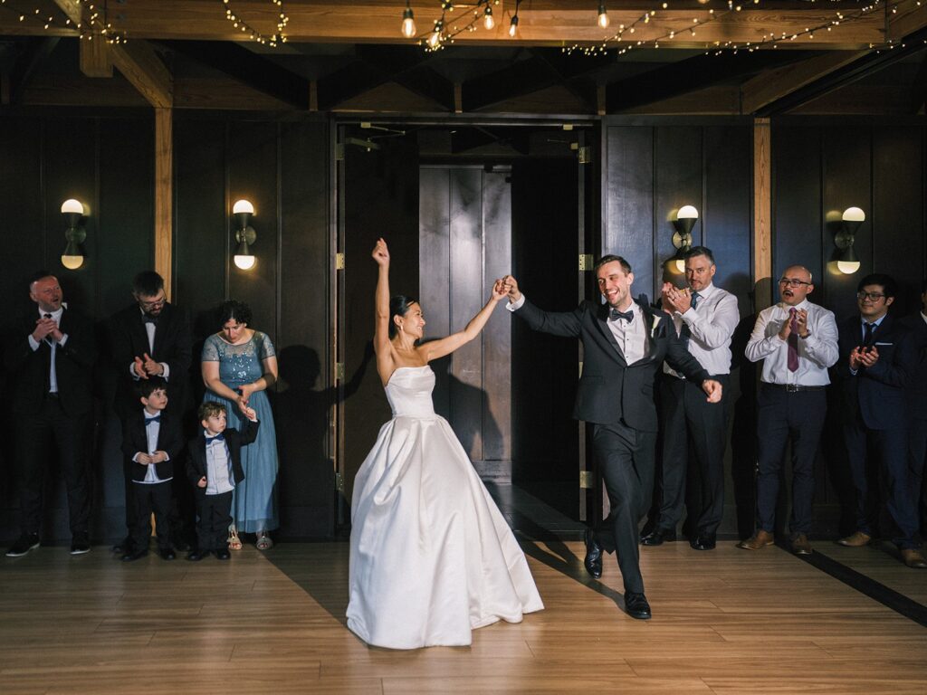 Tiffany and Tim entering their District Winery wedding reception