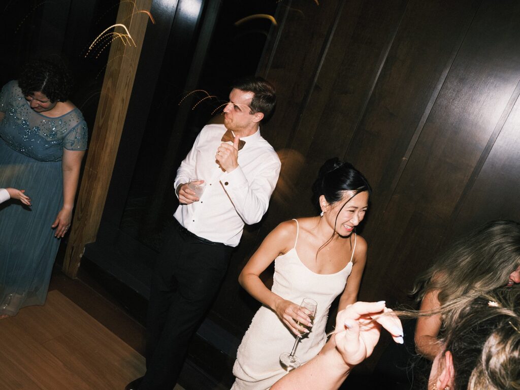 Tiffany and Tim dancing with their wedding guests