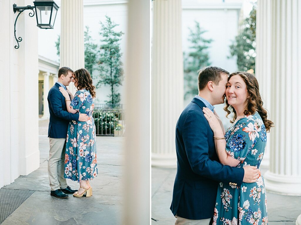 Couple sharing a sweet embrace in between columns at the Richmond Capitol Building grounds during engagement session