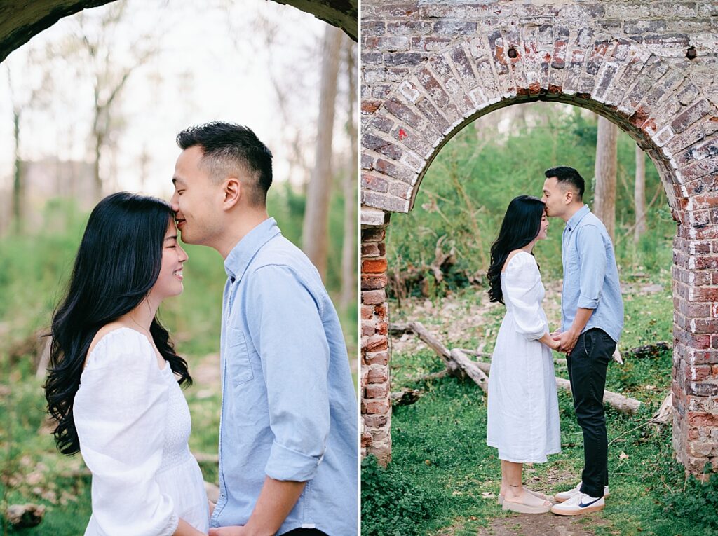 couple in front of brick archway on belle isle