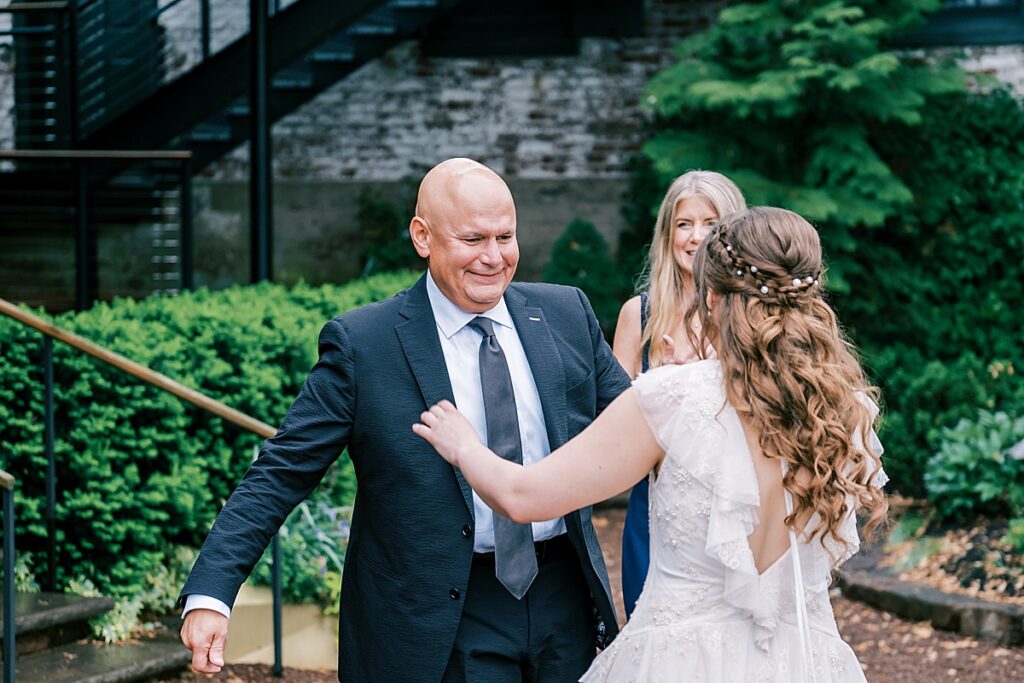 father daughter first look at spring wedding at the carriage house of new hope