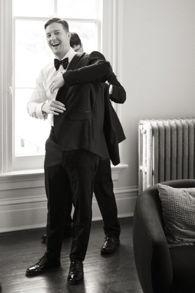 Groom while getting ready at the Merrimon-Wynne House in Raleigh, NC.