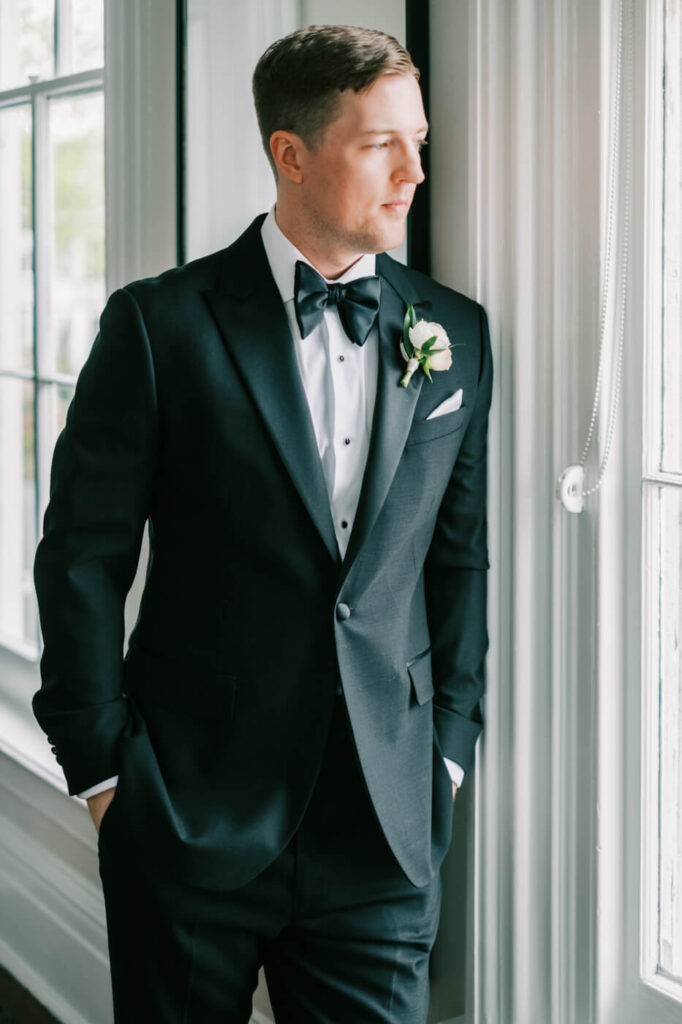 Groom while getting ready at the Merrimon-Wynne House in Raleigh, NC.