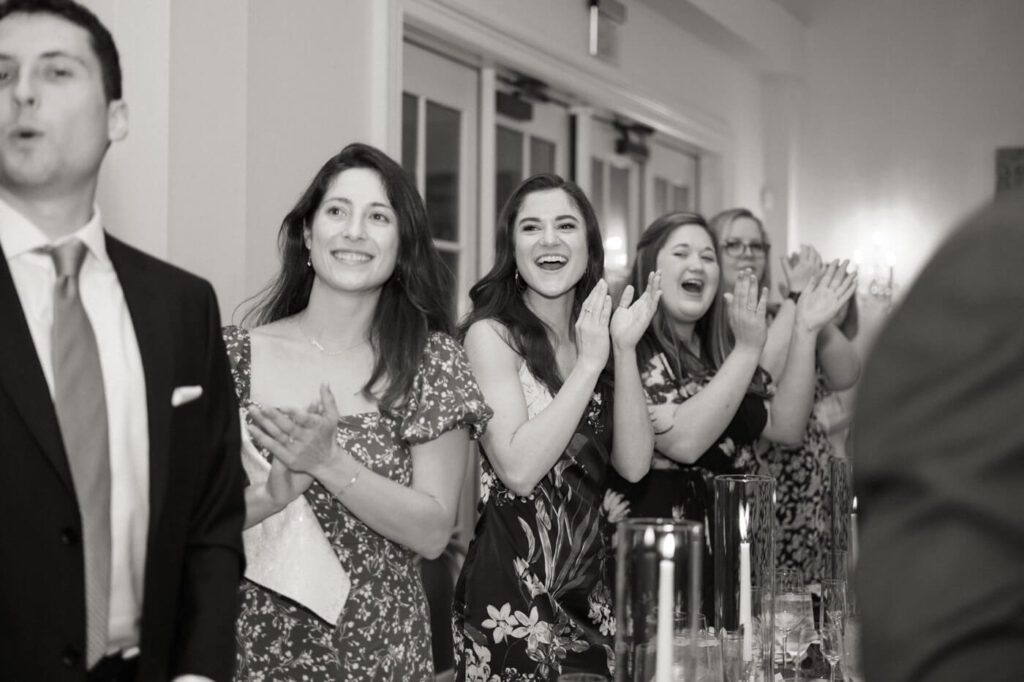 Guests cheer Bride & Groom Reception entrance into the carriage house.