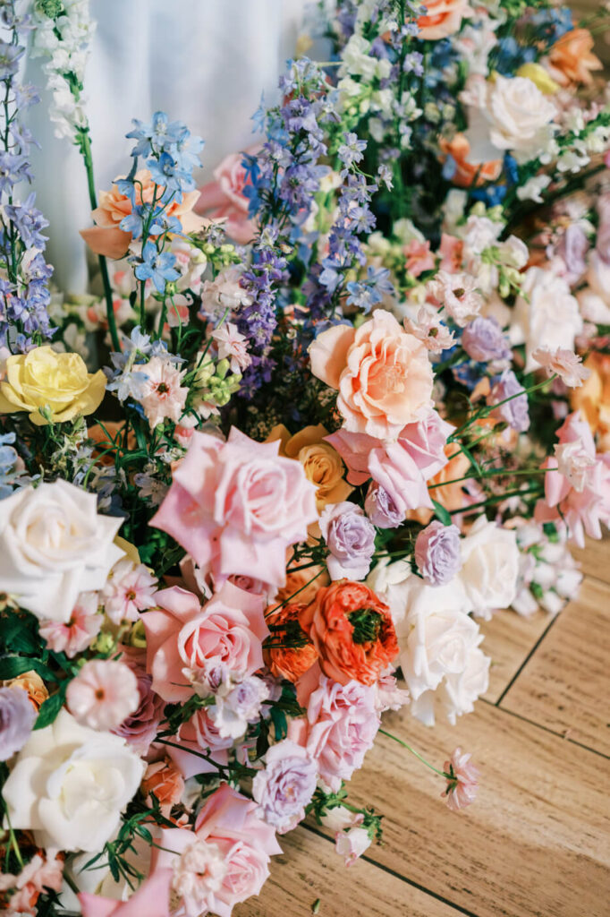 Close-up of colorful floral arrangement indoors, featured in an Asheville mountain wedding by The Reeses.