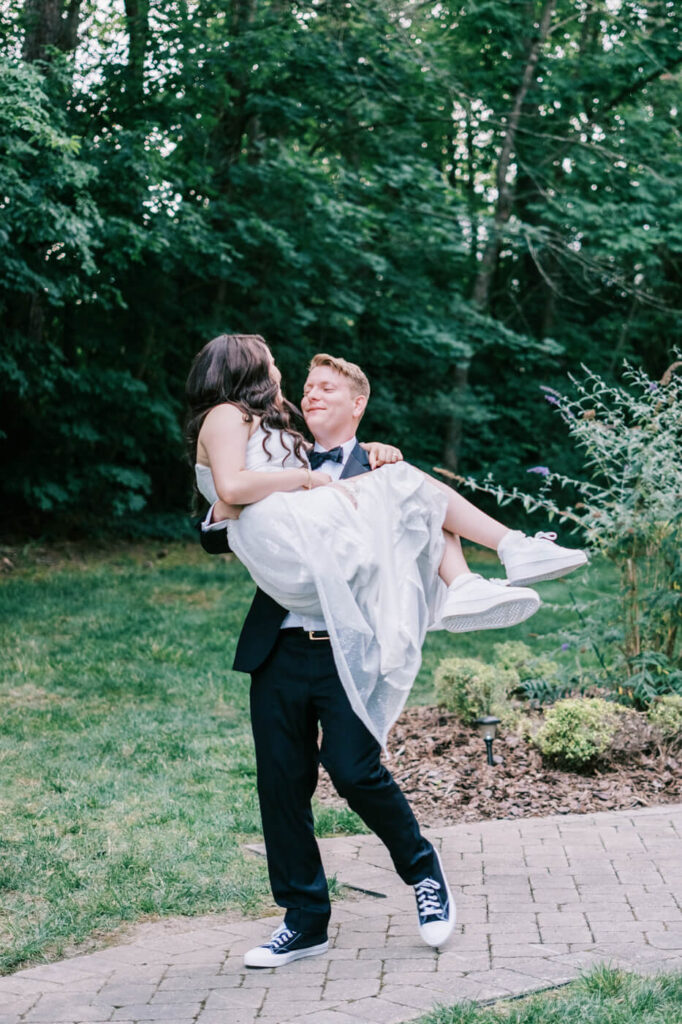 Bride and groom sharing a romantic moment at McAlister-Leftwich House in Greensboro, NC, with soft evening light enhancing the intimate atmosphere.